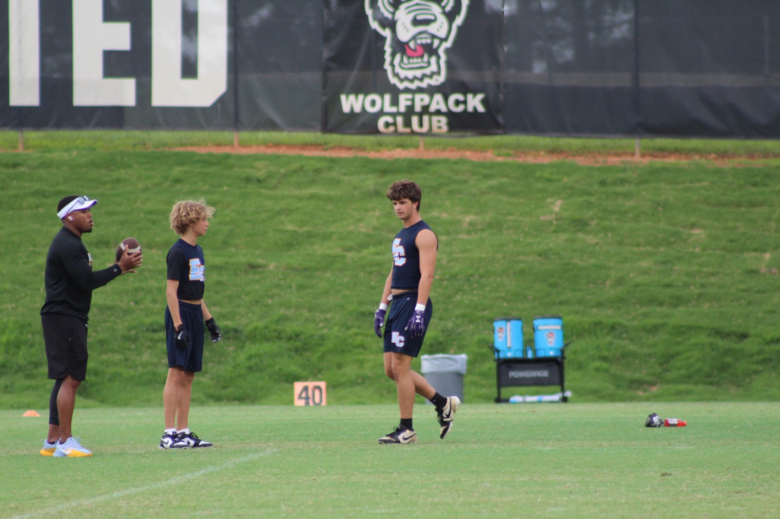 Conlan Elson with D1 coaching staff at NC State camp